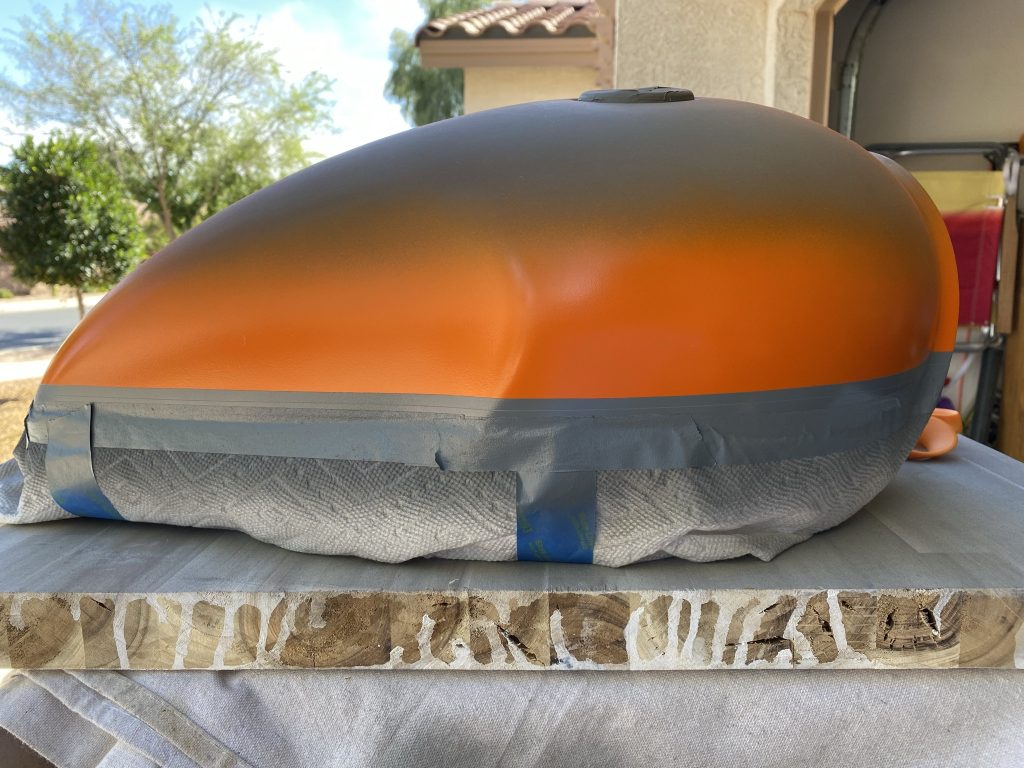 Taping over the orange for the top gray area